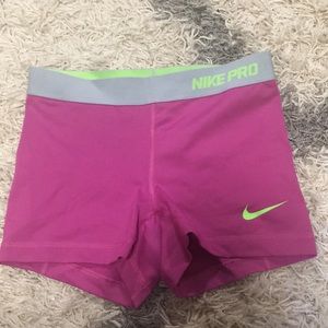 Purple/pink Nike pros
